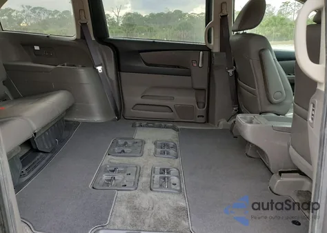 2012 Honda Odyssey Touring z USA, uszkodzony, nr VIN 5FNRL5H94CB144672